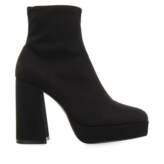 Turenki women's black ankle boots with wide heels and platforms