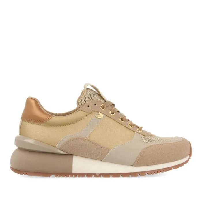 Ebenau women's gold monochrome sneakers with nylon uppers and half-wedge soles