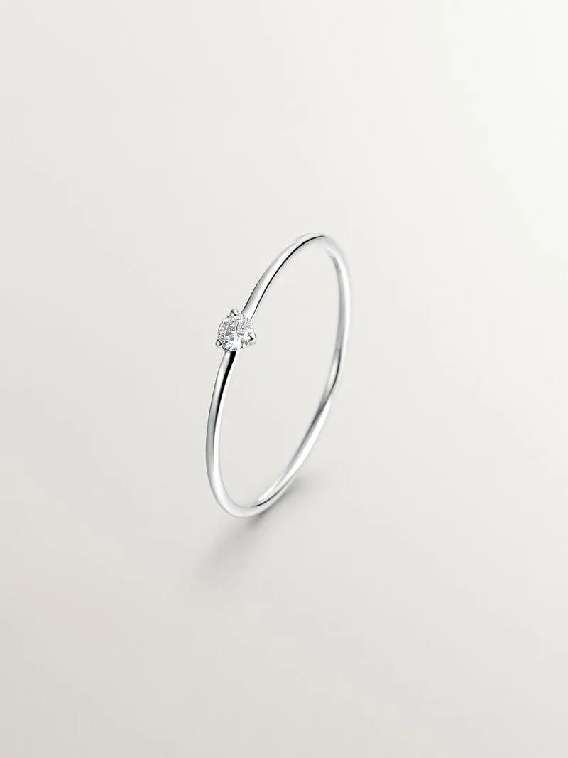 Anillo solitario de oro blanco de 18K con diamante de 0,048cts