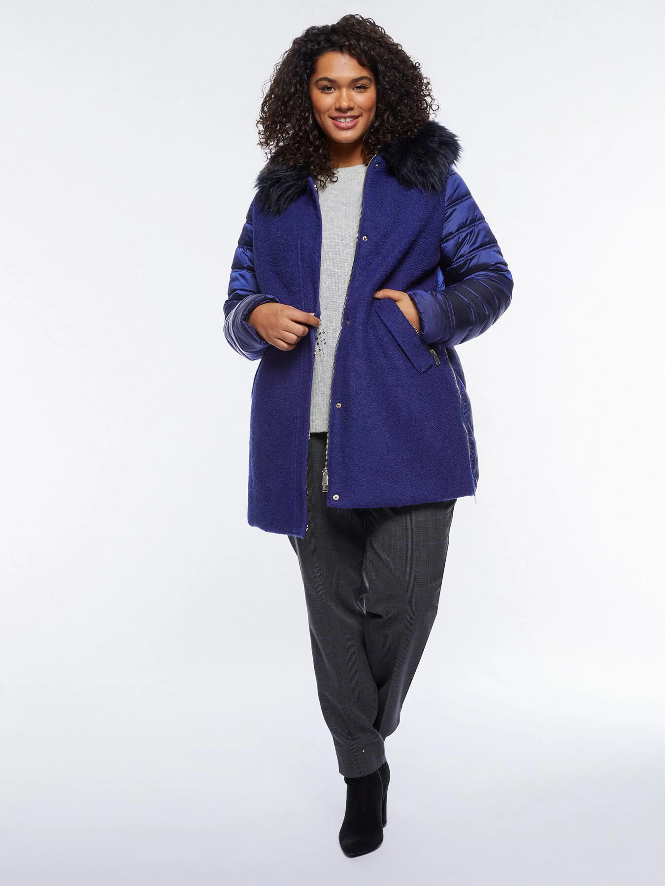 Plumífero con tejido bouclé por delante