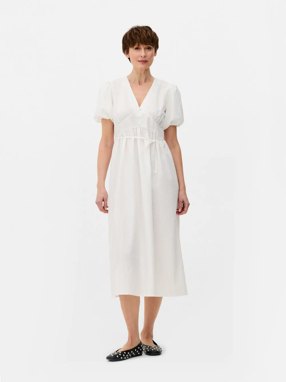 Vestido midi texturizado con botones