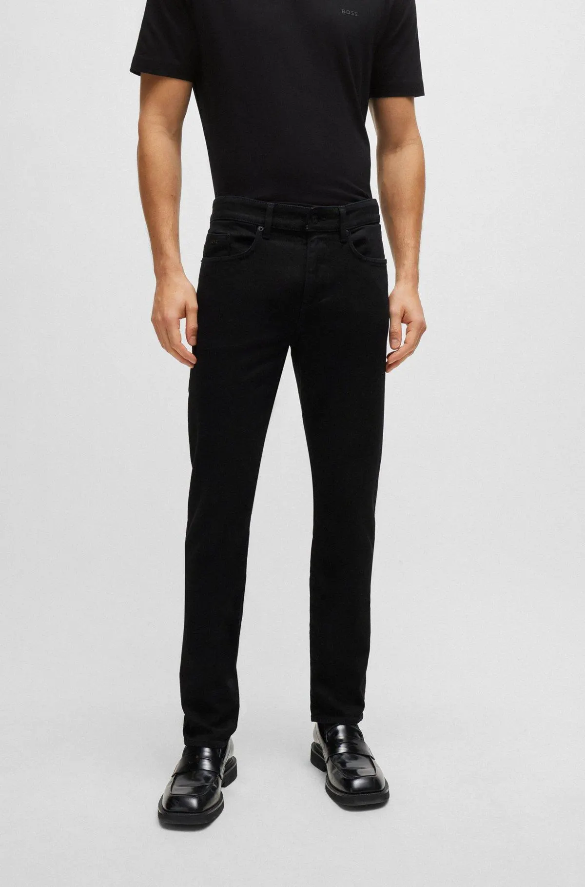 Vaqueros slim fit de denim italiano negro supersuave