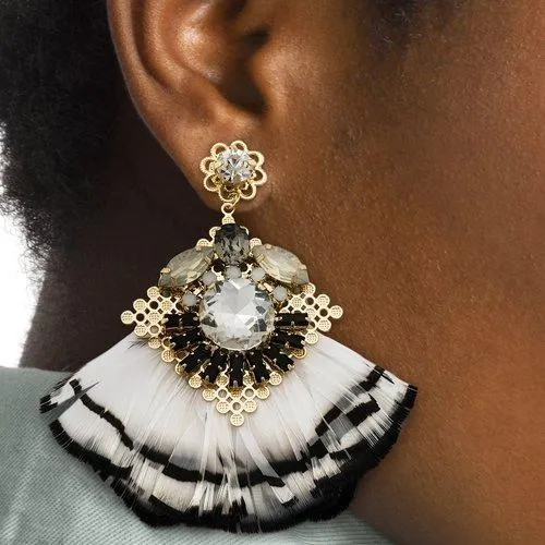 Pendientes plumas blancas