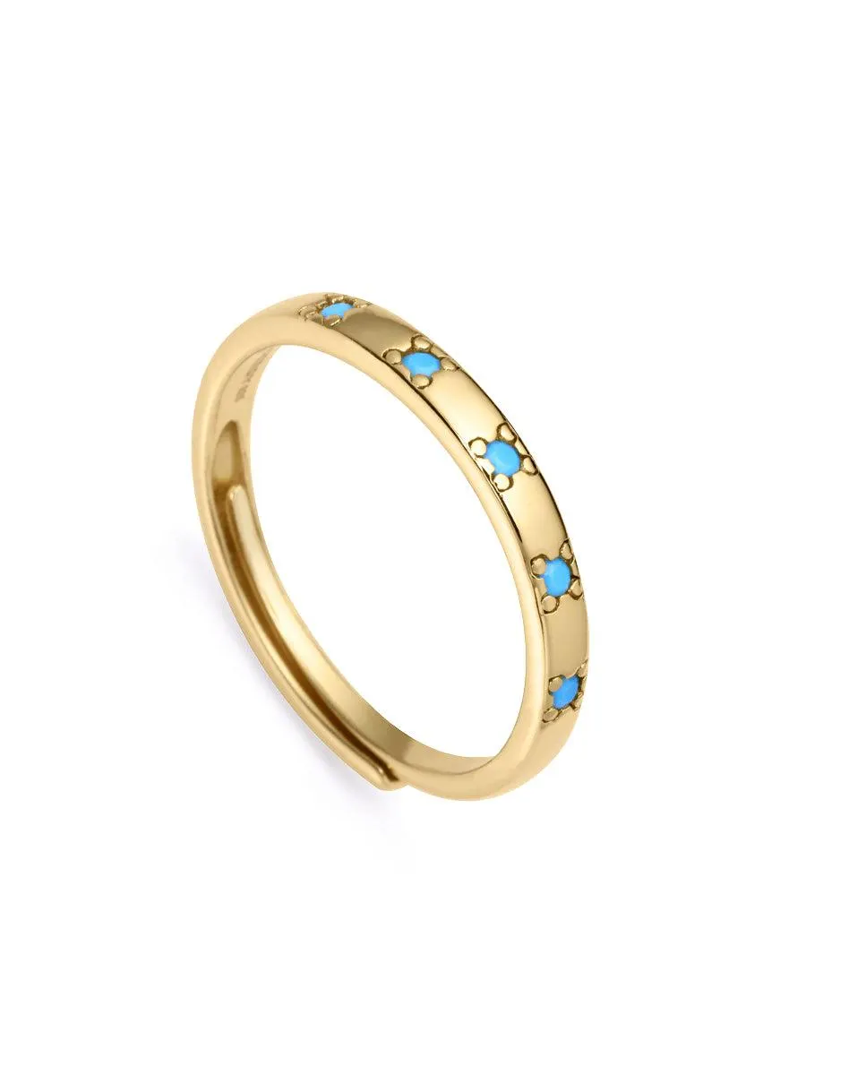 Anillo Trend de plata de ley con baño de oro y circonitas en color azul