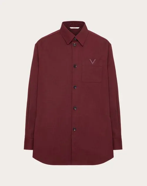 SOBRECAMISA DE LONA DE ALGODÓN ELASTIZADO CON DETALLE DE V ENGOMADA