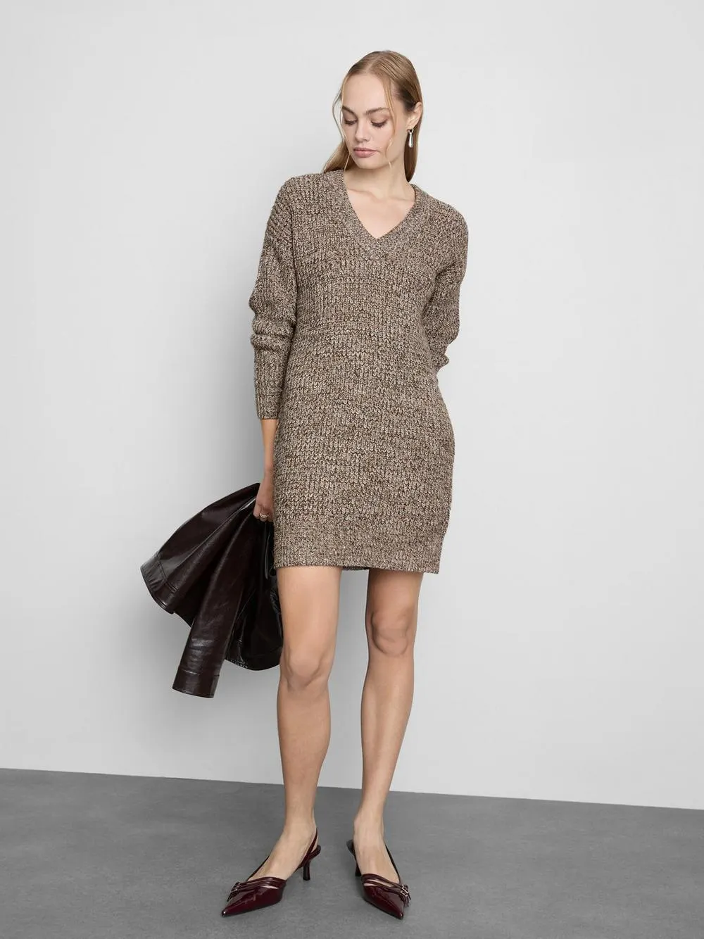 Vestido de punto corto metalizado tipo jersey