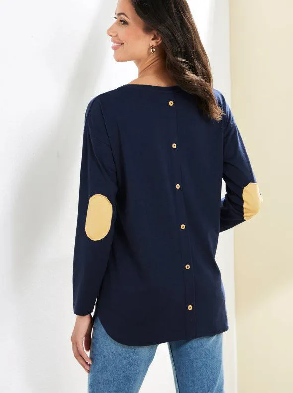 Camiseta manga larga con coderas y botones detrás