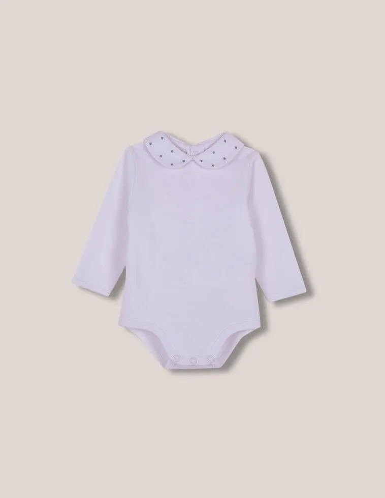 body cuello pique con bodoques