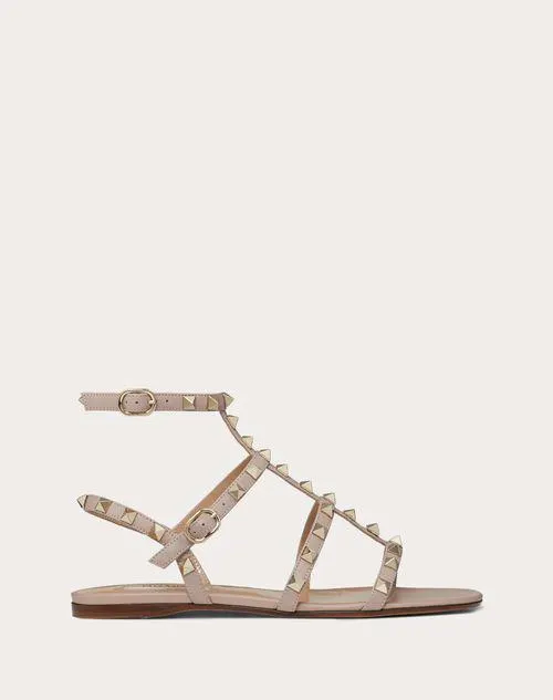 SANDALIAS PLANAS ROCKSTUD DE PIEL DE BECERRO CON TIRAS