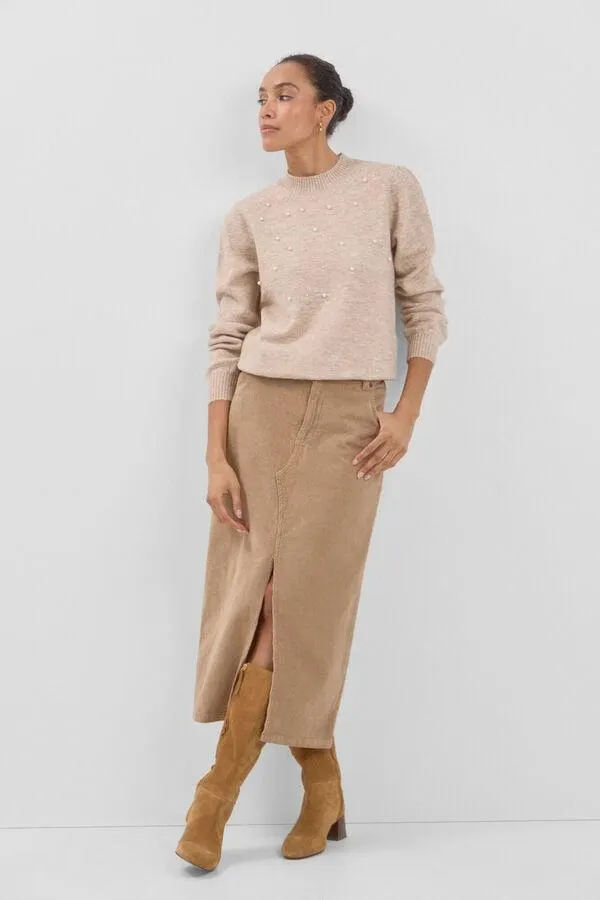 Conjunto de bota, jersey y falda