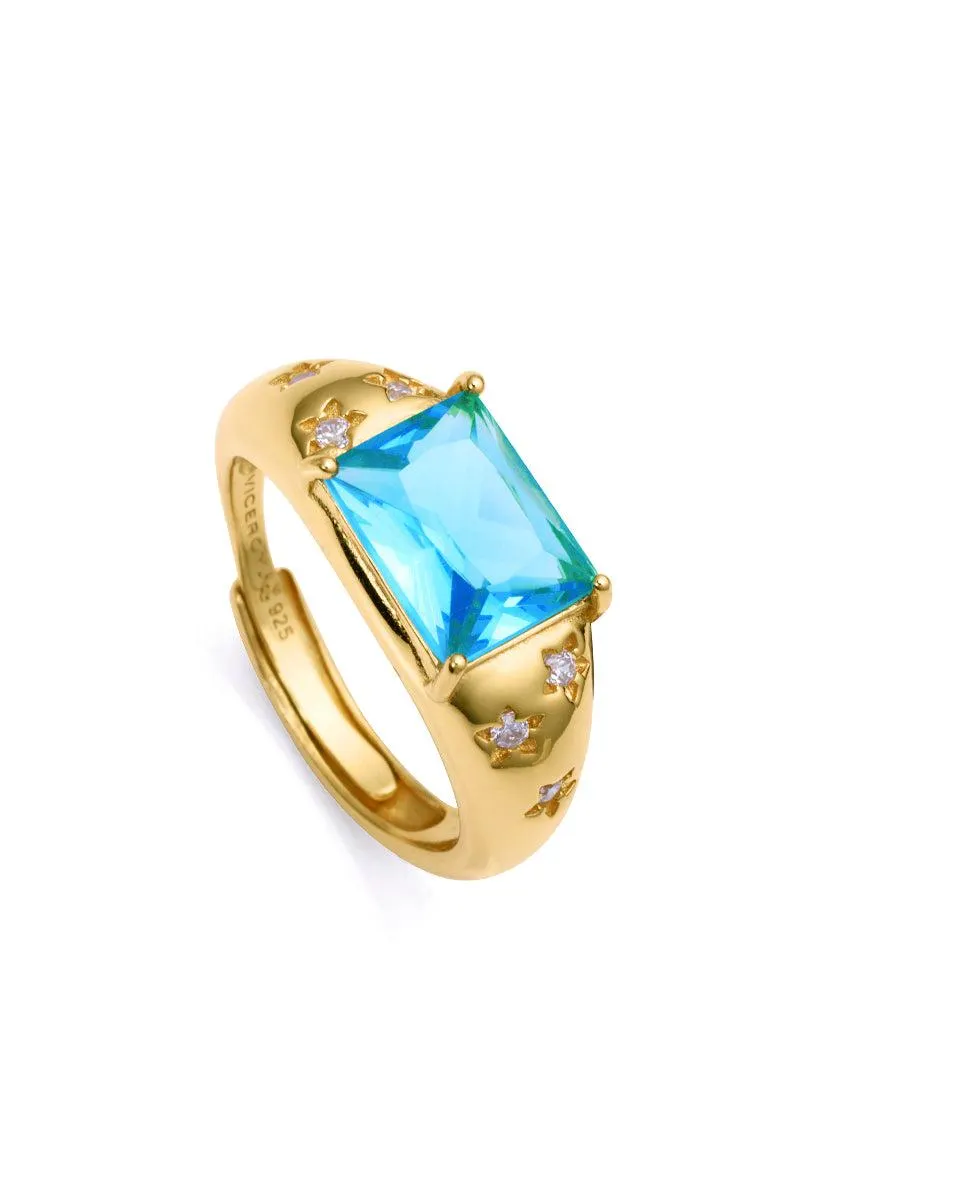 Anillo Elegant de plata de ley con baño de oro , cristal azul y circonitas blancas