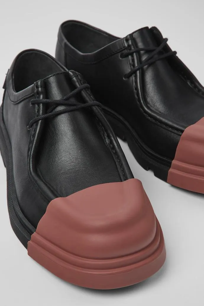 Junction Mocasín de piel negro para mujer