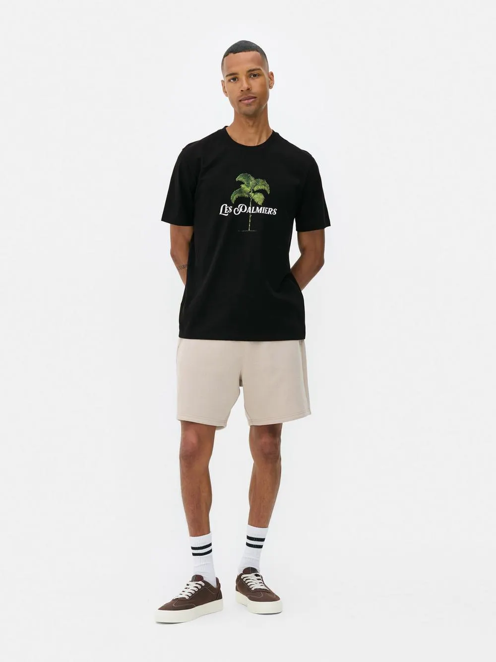 Camiseta de manga corta con estampado de palmeras