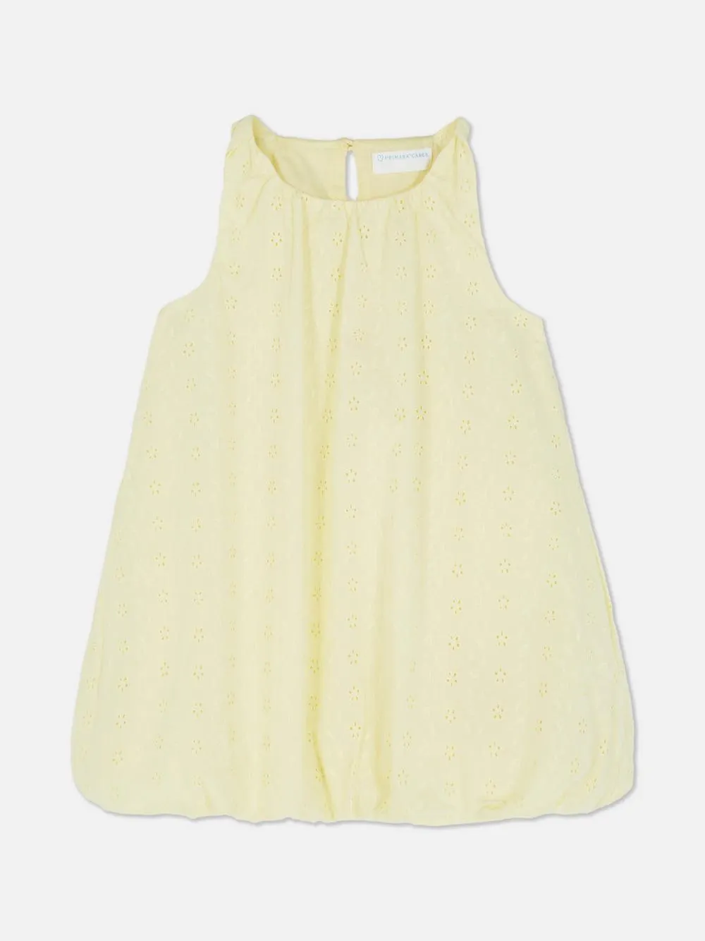 Vestido con bordado inglés y bajo abullonado