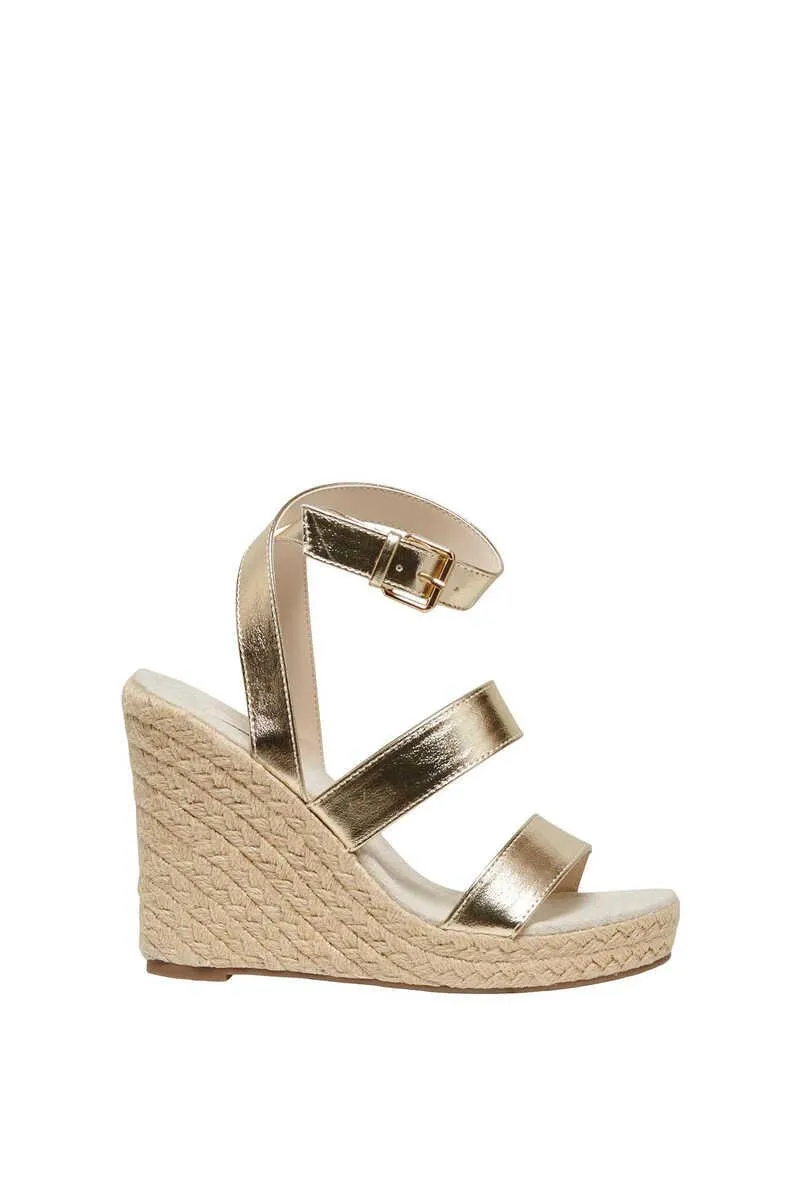 Sandalia de cuña tiras atada