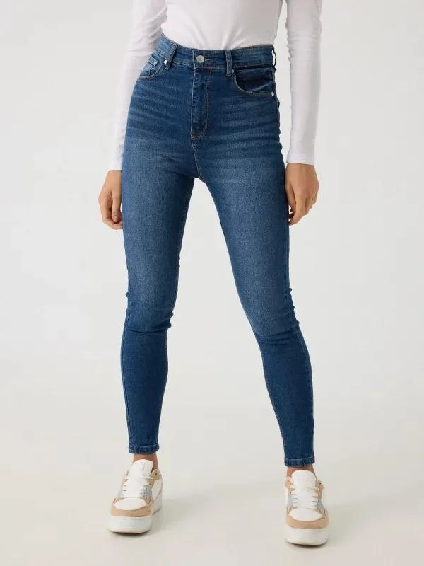 Jeans skinny tiro alto cinco bolsillos azul