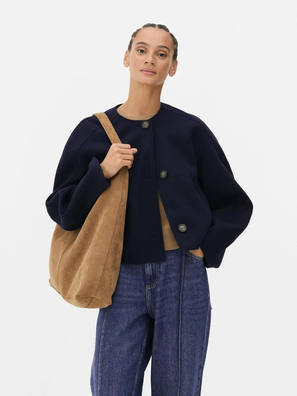 Chaqueta sin cuello con manga abullonada