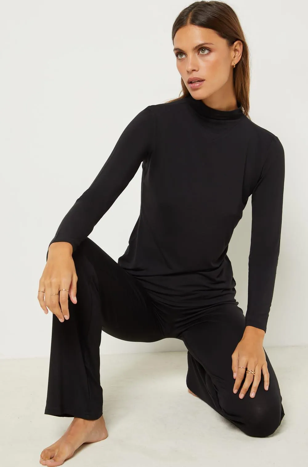 Jersey fino de cuello alto, tejido termorregulador