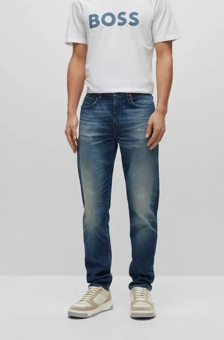 Vaqueros tapered fit de cómodo denim elástico azul