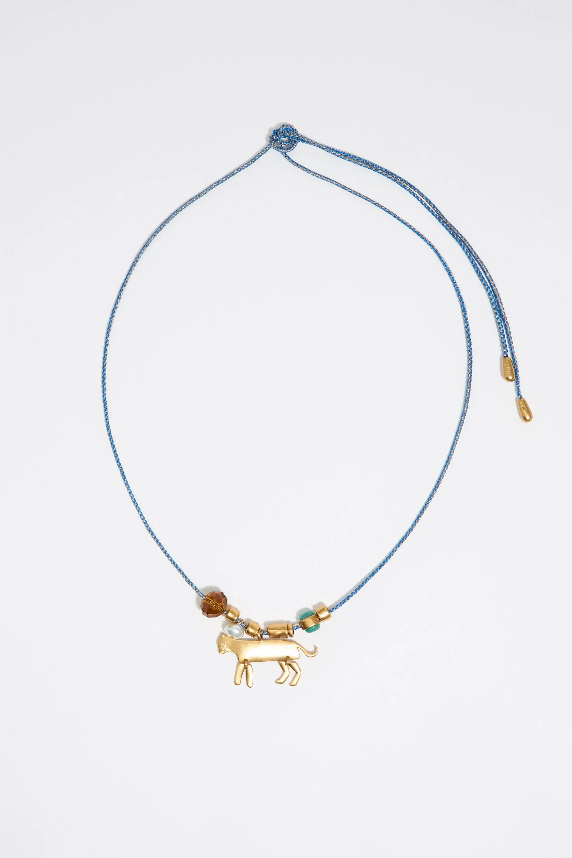 Collar largo cordón trenzado con motivos metal dorado