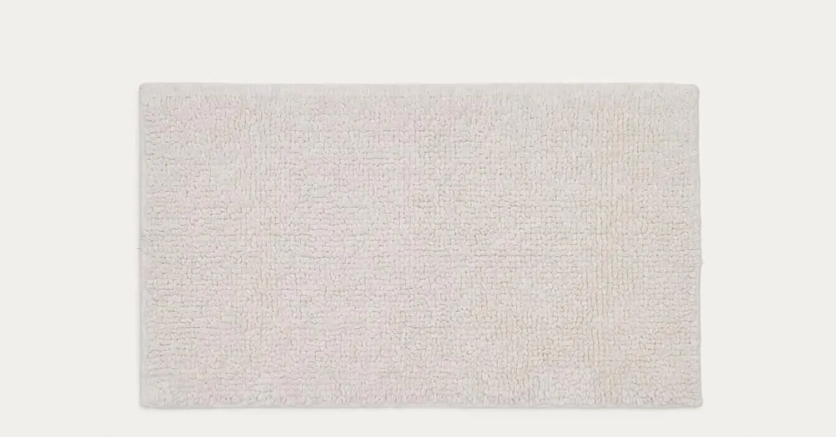 Alfombra de baño Uvite 100% algodón blanco 50 x 70 cm