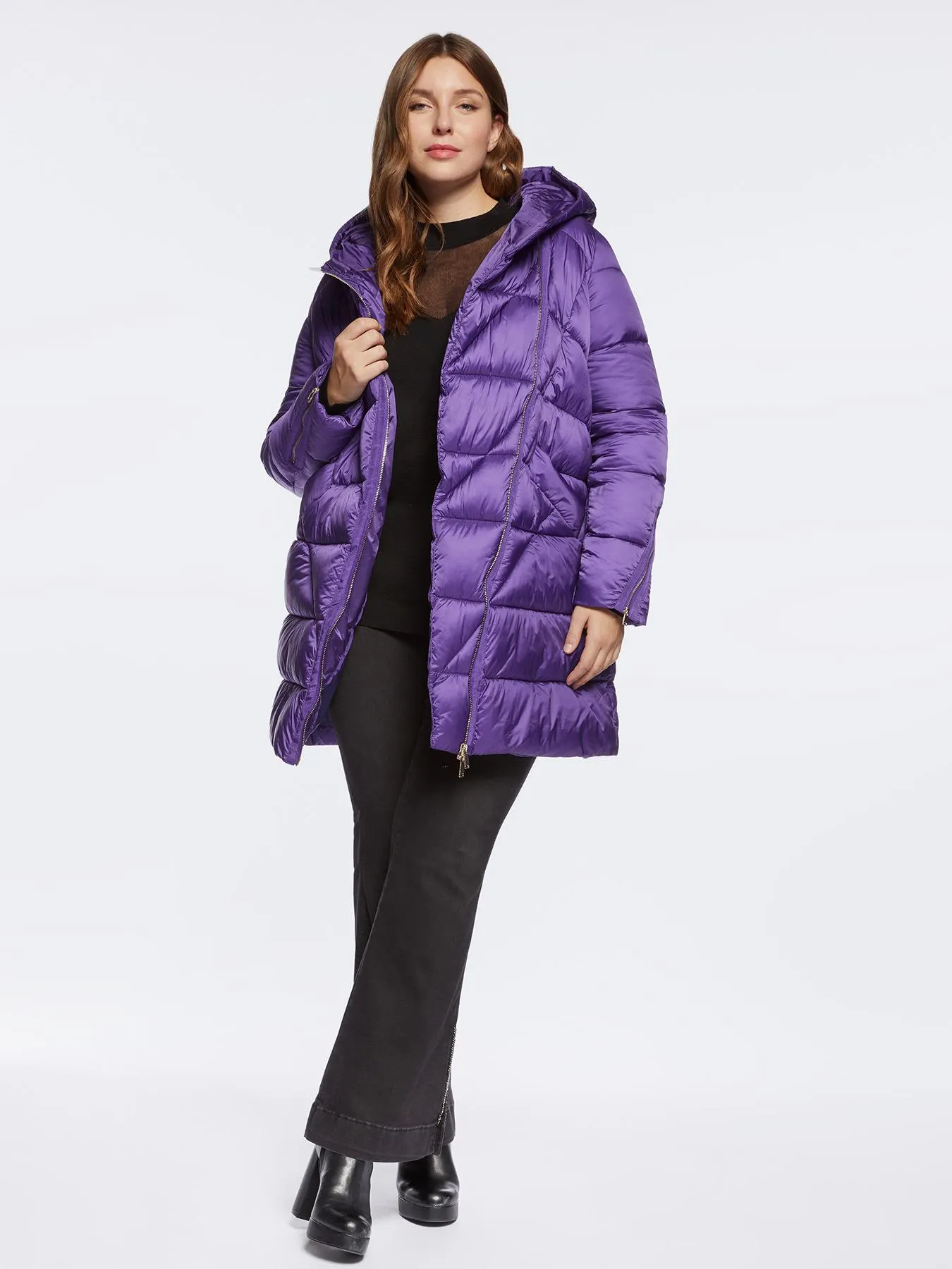 Plumífero con cierre asimétrico