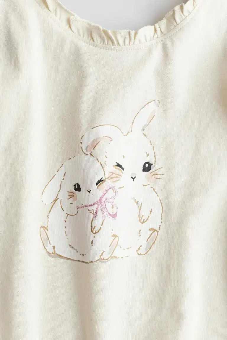 Röyhelöreunainen toppi