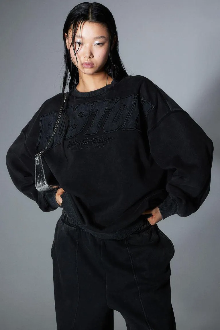 Applikoitu oversize-collegepusero