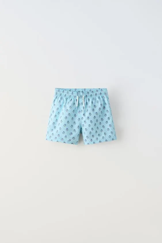 6-14 YEARS/ FLORAL PRINT SWIM SHORTS