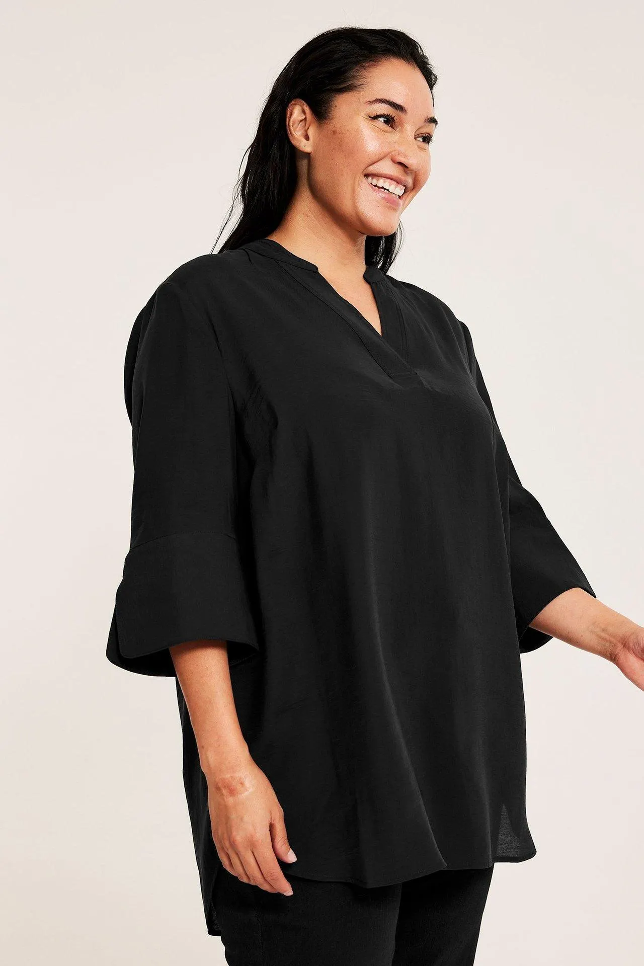 V-kauluksellinen pusero