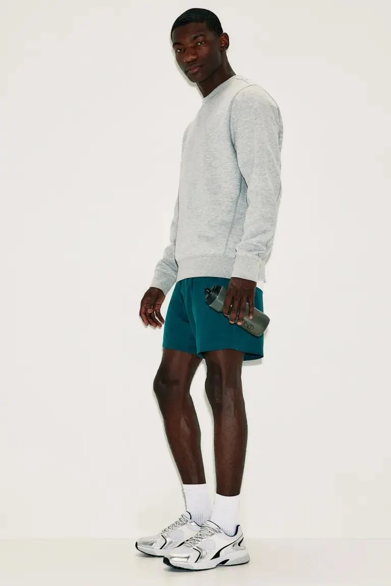 Kankaiset taskulliset DryMove™-treenishortsit