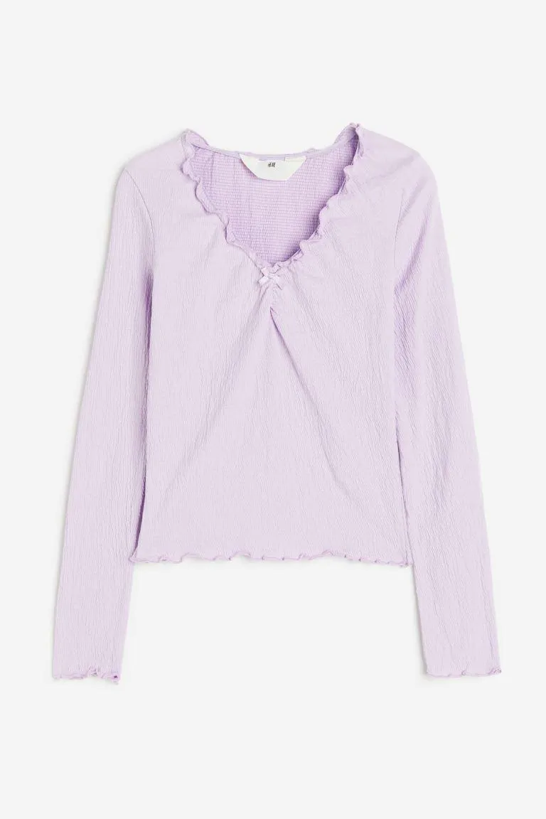 Rypytetty trikoopusero