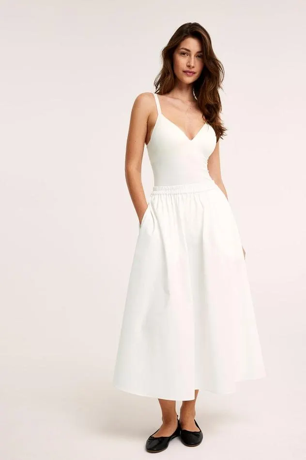 Saumaton toppi, jossa on sisäänrakennetut rintaliivit