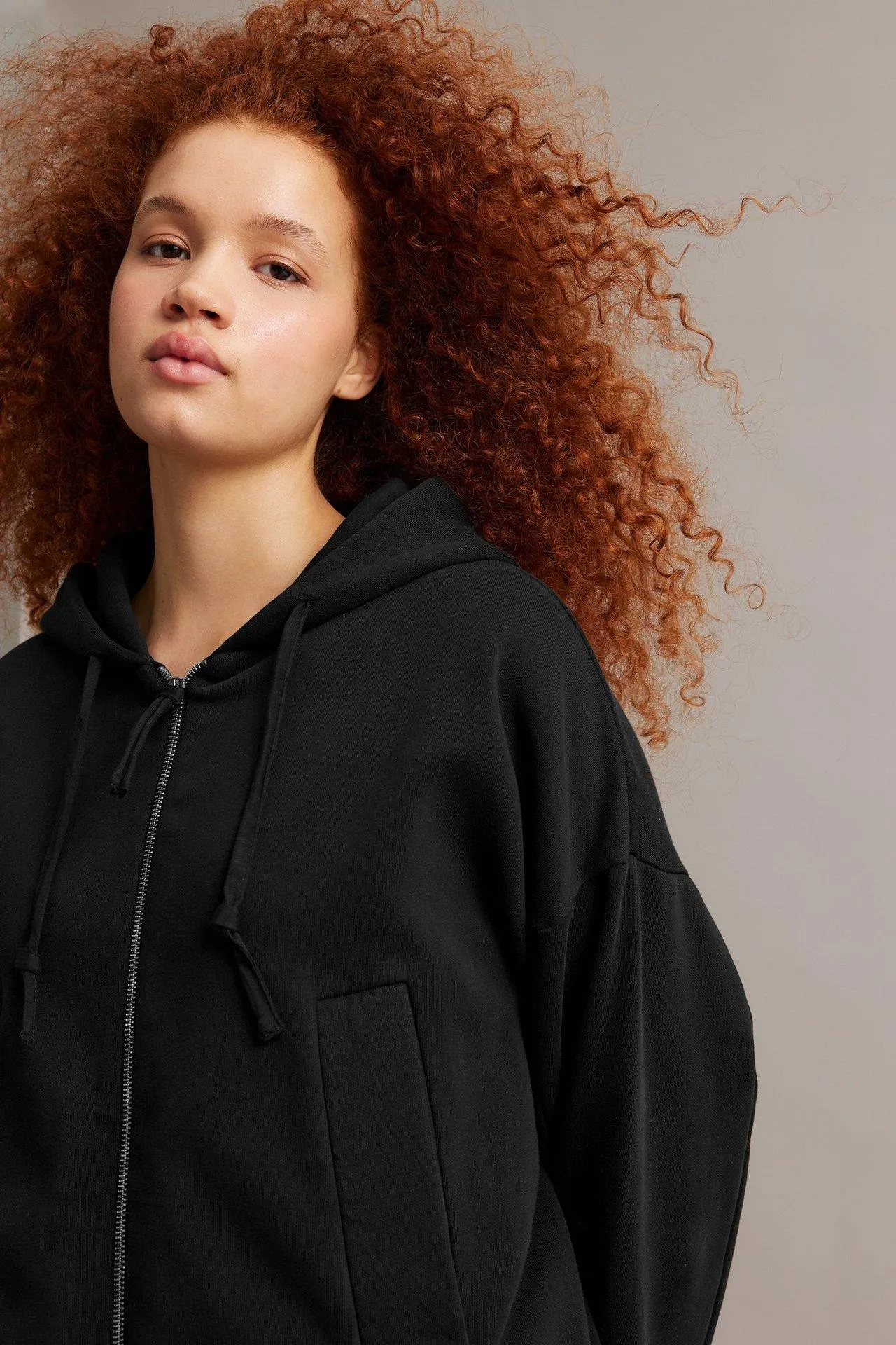 Vetoketjullinen huppari