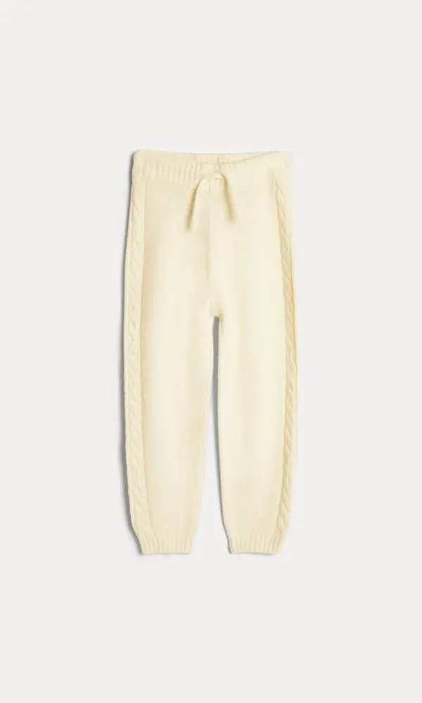 Housut palmikkoneulosta