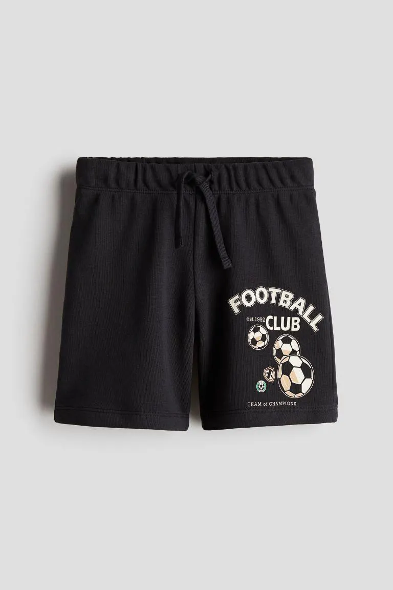 Painokuvioiset collegeshortsit