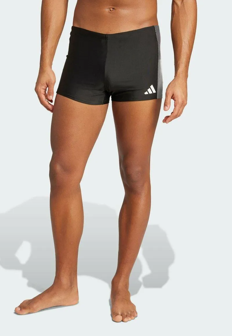 Uimahousut punteilla - black