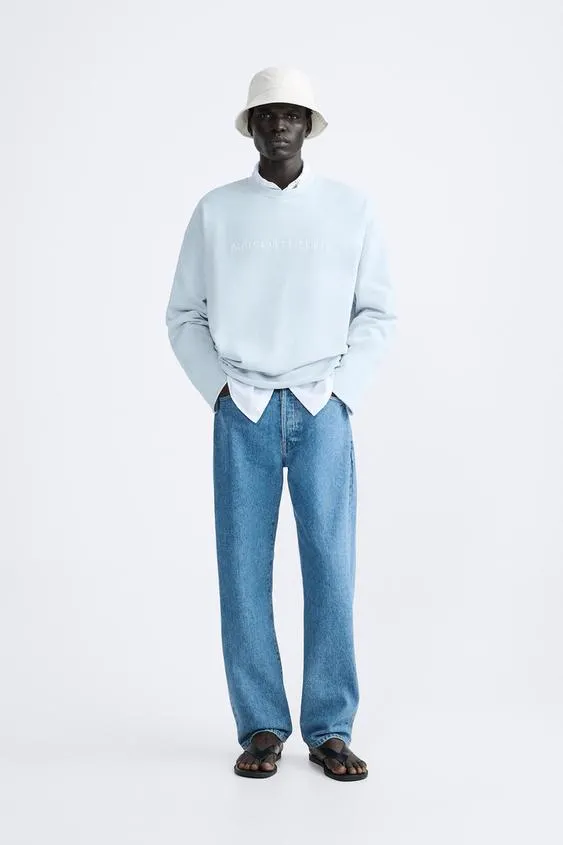 SWEATSHIRT WITH IRREGULAR TRIMS