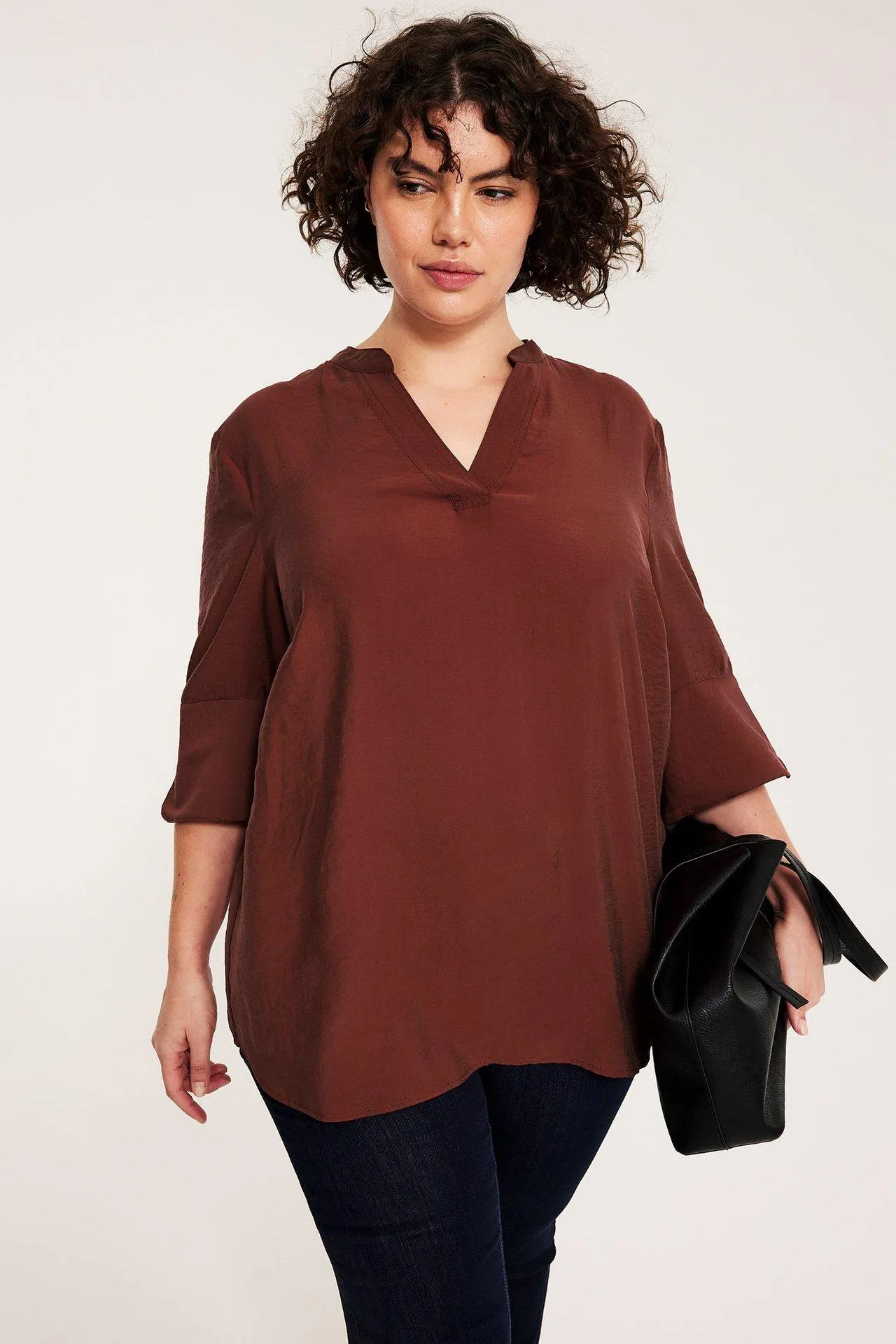 V-kauluksellinen pusero