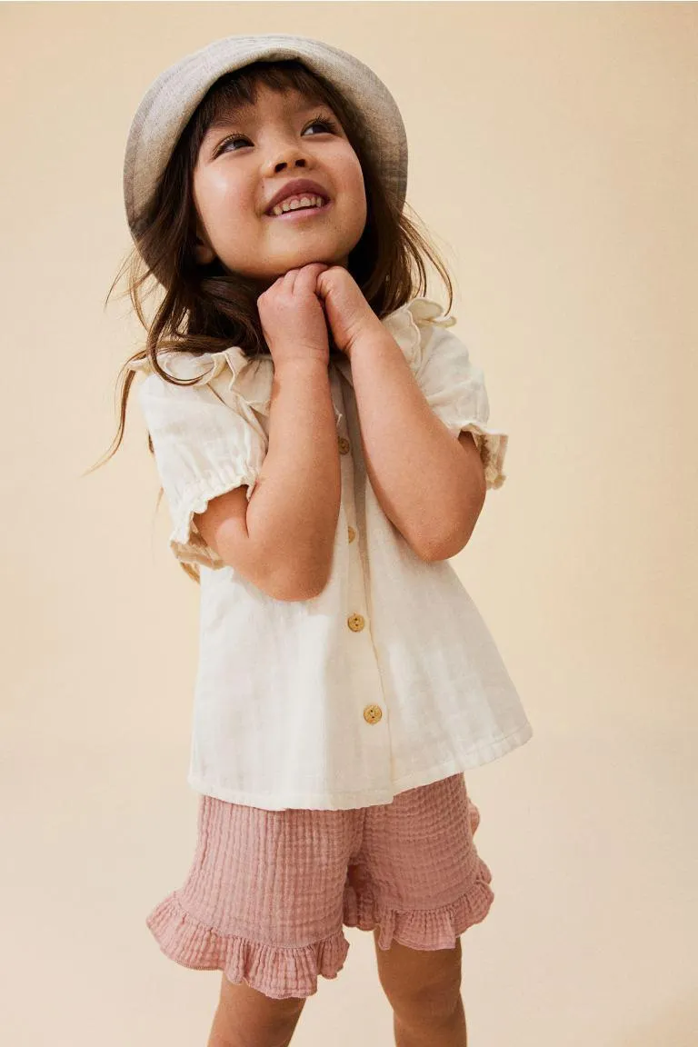 Röyhelöreunaiset puuvillashortsit