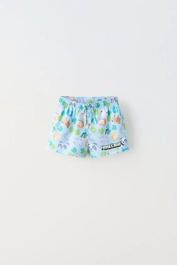6-14 YEARS/ MINECRAFT © MOJANG AB. ™ SWIM SHORTS