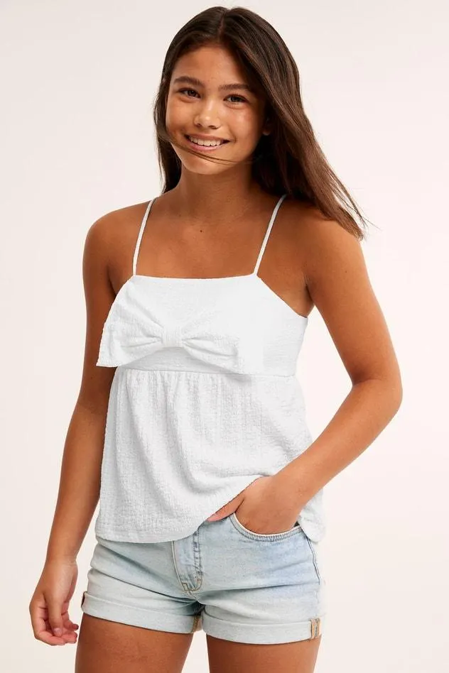 Toppi, jossa on rusetti