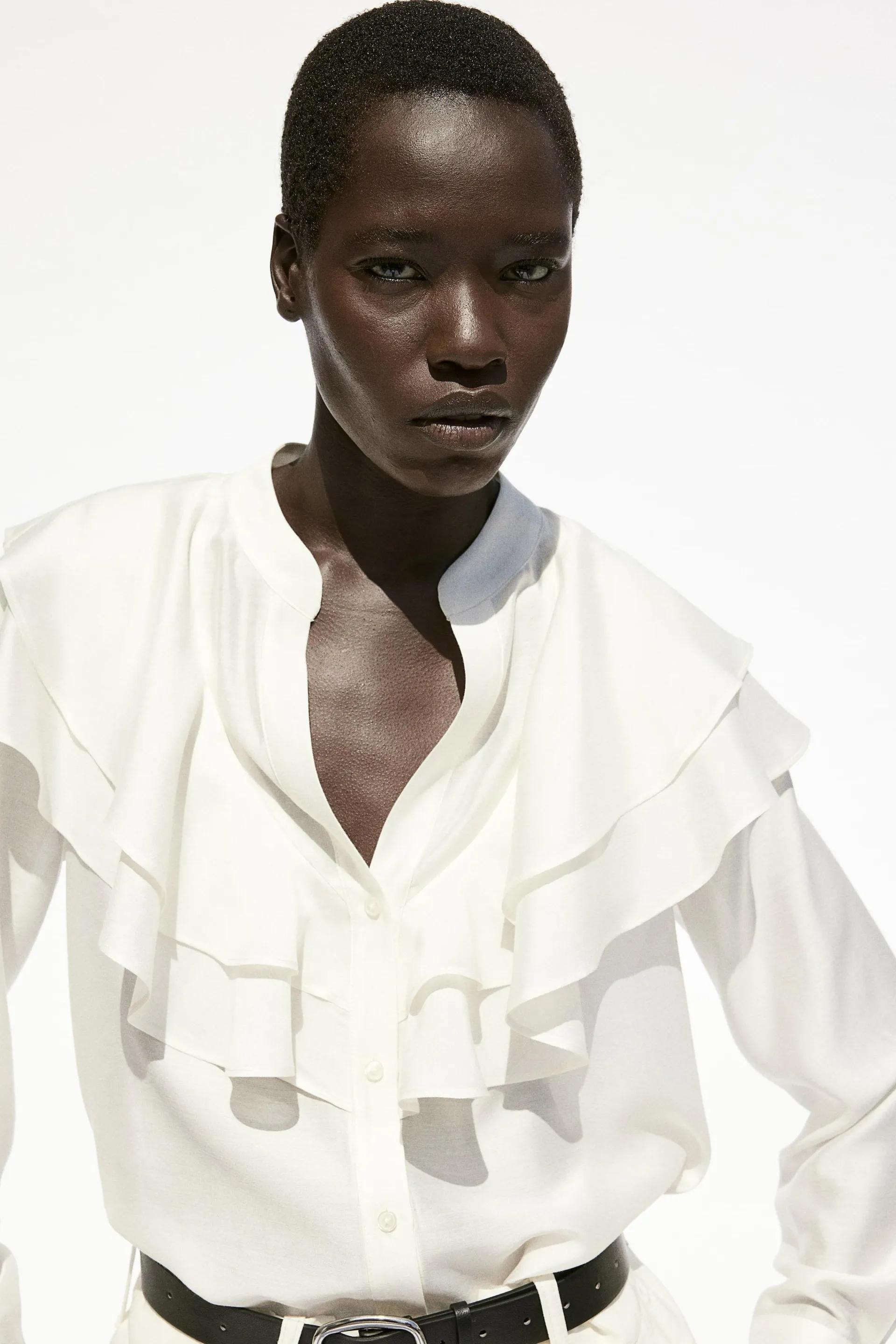 Röyhelöreunainen pusero