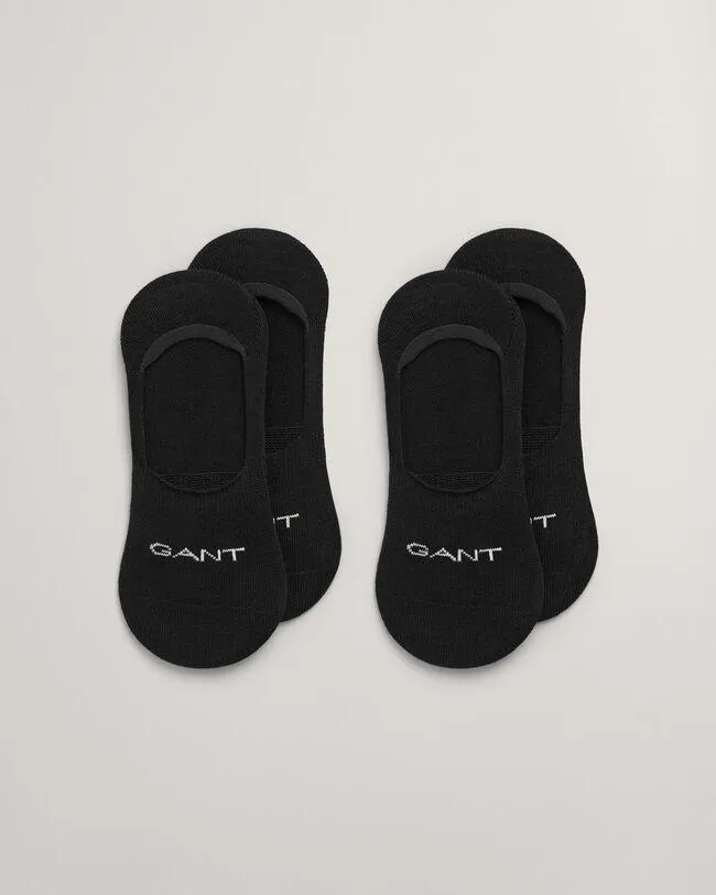 Jalkapöydässä intarsiatekniikalla toteutettu GANT-logo