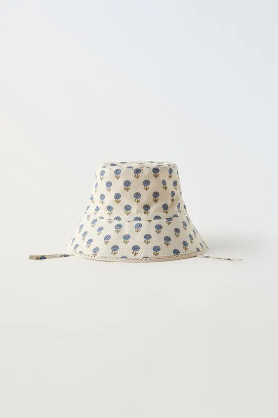 REVERSIBLE FLORAL CHECK BUCKET HAT