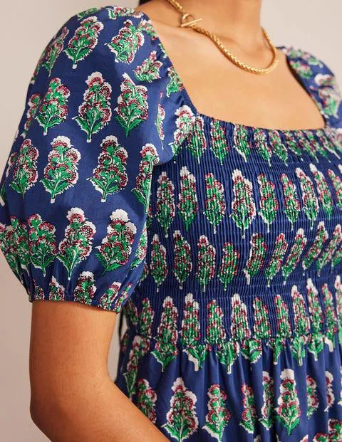 Robe longue avec corsage à smocks