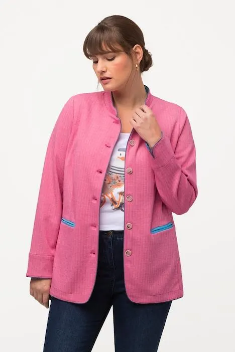 Veste traditionnelle en molleton style « Janker ». Motif à chevrons, col montant et couleurs contrastantes.