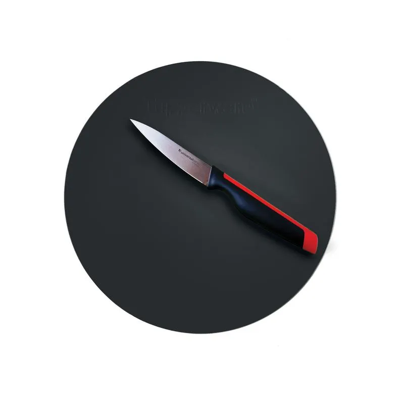 Planche souple ronde indispensable pour découper légumes, fruits, poissons,...