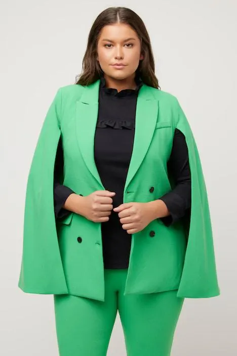 Blazer et cape, ligne en A, col à revers, deux rangées de boutons.