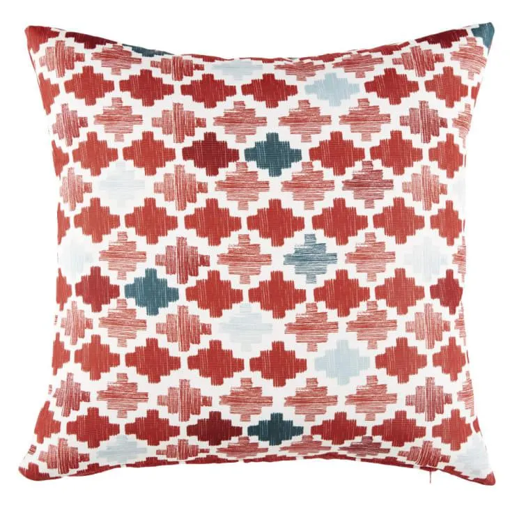 Cojín con motivos gráficos estampados en naranja, verde y blanco 45x45